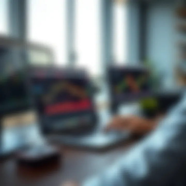 Laptop showing IQ Option platform with trading charts and user-friendly dashboard